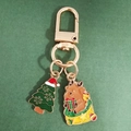 Christmas alloy keychain with reindeer and snowy tree charms in festive green and red - Christmas Tree and Reindeer