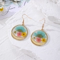 Pastoral style stainless steel earrings featuring colorful dried flowers in gold circles - Blue Daisy Three-Color Flowers
