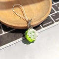 Realistic gradient resin lotus root keychain with silver lobster clasp on wooden tray - Blue-Green Cheese