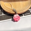 Macro detail of a pink lunar meteorite resin charm with realistic crater texture and silver ring - Rose Red Gradient Cheese