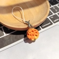 Close-up of orange 3D resin cheese keychain with realistic hole details and silver clasp - Orange Gradient Cheese