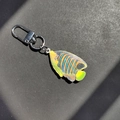 Close-up of a colorful tropical fish keychain with soft flocked texture and metal clasp - Yellow Striped Fish