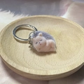 Detailed view of plush hedgehog keychain with soft texture and metallic ring clasp - Side-lying Hedgehog