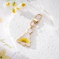 Christmas tree keychain with real yellow daisy dried flower in golden resin frame - Yellow Daisy Christmas Tree