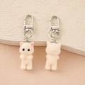 Front and back view of cute beige flocked cat keychains with pink ears and silver clips - Beige Flocked Cat