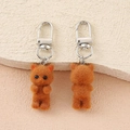 Close-up of adorable flocked kitten charms with detailed plush texture and silver clasp - Brown Flocked Cat