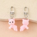 Detailed close-up showing front and back of pink flocked cat plush keychain with silver clip - Pink Crawling Cat