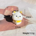 Detailed view of a mini flocked cow keychain with 2.1x2.9cm dimensions and weight info - Flocked Calf