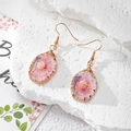 Handmade gold earrings with pink dried flowers and pearls in resin on white stone - Pink White Pearl Style