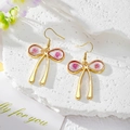 Elegant gold bow earrings with real pink dried rose and gold foil inside a clear pendant - Pink Rose
