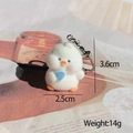 Cute fluffy chick plush keychain with blue heart and metal carabiner clip, 3.6cm high - Flocked Duck with Shovel
