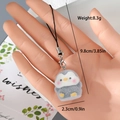 Detail view of a cute gray flocked penguin keychain with dimensions and weight specs - Penguin (MR70)