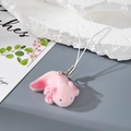 Close-up of a pink flocked axolotl keychain pendant with soft texture and metallic ring - Pink Axolotl (MR107)