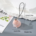 Detailed view of pink flocked resin capybara keychain with a black lanyard and silver clip - Sitting Capybara (MR106)
