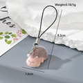 Detail view of pink flocked hedgehog keychain showing 9.3cm length and lobster clasp - MR42 Hedgehog Squinting and Lying