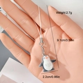 Detail of grey penguin flocking pendant showing size dimensions and lobster clasp - Flocked Penguin (12MR82-7)
