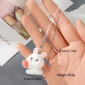 Detail of white flocked rabbit charm with strawberry, showing dimensions and metal clasp - White Rabbit Style (3MR17)
