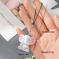 Detailed view of a white flocked elephant charm with measurements for height and width - White Elephant Style (5MR17)