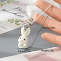 Detail showing dimensions of white flocked rabbit keychain charm with 1.4cm width and 9.5cm length - Round White Rabbit (5MR95)