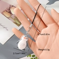 Close-up of a cute flocked penguin charm with size dimensions and silver metal clasp - Gray White Penguin Style (8MR19)