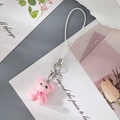 Close-up of pink flocked bear charm with silver lobster clasp and decorative bow detail - MR70 Pink Bear
