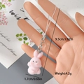 Detailed size view of a 1.7cm pink flocked bunny charm with silver lobster clasp and strap - Pink Devil Rabbit (11MR39)