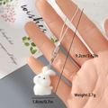 Cute flocked white rabbit charm with elastic strap and metal buckle, weight 3.7g - Blushing White Rabbit (12MR39)