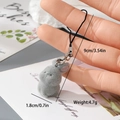 Macro detail of a 1.8cm grey flocked rabbit charm with dimensions and cord length - Gray Flocked Rabbit (13MR39)