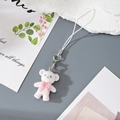 Close-up of a white flocked bear keychain with a pink bow and silver metal clasp - MR18 White Bear