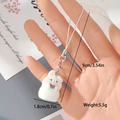 Cute white flocked bunny charm with pink details and dimension marks 9cm total length - Rabbit with Red-Green Decor (16MR110)