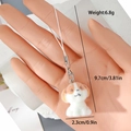 Détail du porte-clés chiot en peluche pesant 6.8g et mesurant 9.7x2.3cm - Chien Blanc Taches Oranges (15MR27)