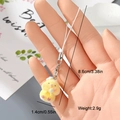Macro detail of yellow flocked duck keychain with size measurements and soft plush texture - Yellow Plush Chick (7MR59)