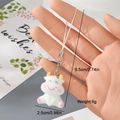 Detail of cute flocked resin calf pendant showing plush texture and small size dimensions - Cute Blush Cow (AMR83)