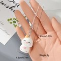 Detail view of the cute white duck keychain with dimensions 9.6cm length and 1.9cm width - White Ball with Crown (10MR87)