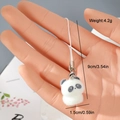 Close-up of a 9cm cute black and white flocked resin panda keychain with metal clasp - Classic Panda Style (4MR65)