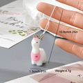 Detail view of a white alpaca keychain with a pink heart bib and size specifications - Heart Bib Alpaca Style (6MR44)