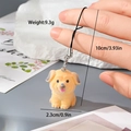 Joli pendentif porte-clés chien en résine floquée orange avec cordon noir pour téléphone - Chiot Orange Jaune (24MR85)