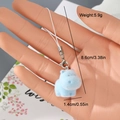Detailed view of light blue flocked hippo keychain with lobster clasp weighing 5.9 grams - Light Blue Hippo Style (6MR65)