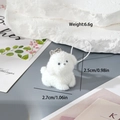 Detailed view of white flocked puppy keychain with precise size and weight specifications - Looking Up Dog (MR21)