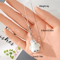 Close-up of a 4g flocked penguin charm showing 9.8cm length and soft texture detail - Grey White Penguin Style (15MR82)