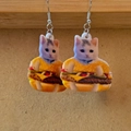 Detailed close-up of acrylic cat burger earrings with silver hooks and fun cat print - Burger Cat Shape (H)