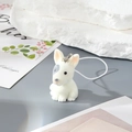 Cute white flocked resin puppy keychain with metal ring and cord on aesthetic background - Grey Eyed Dog (MR85)
