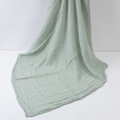 Soft mint green bamboo cotton baby swaddle blanket with breathable muslin texture - Bean Green
