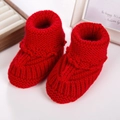 Red knit newborn baby winter warm booties with thick ribbed texture and turnover cuff - Red