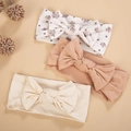 Three-piece baby bow headband set in floral white, dusty rose, and beige ribbed fabric - Style DP303-2