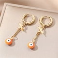 Gold evil eye earrings with orange bead and bird pendant in high polished finish - Orange Eye Bird Charm / Gold