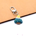 Christmas tree keychain with green resin body, white snow cap and silver metal clip - Christmas Tree