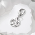 Silver hollow globe pendant keychain with large lobster clasp on stone display - Round Earth (Lobster Clasp)