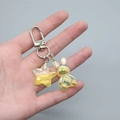 Cute iridescent translucent rabbit keychain with yellow glitter star pendant and silver clasp - Transparent Yellow