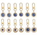 Set of 12 gold alloy evil eye keychains with blue rhinestones on a white background - Main Style (Assorted Designs)